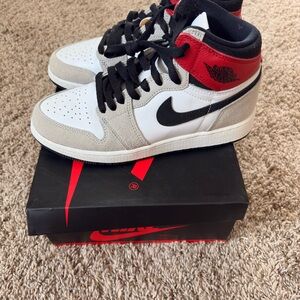 Nike Air Jordan Retro High in White, Black, and Red